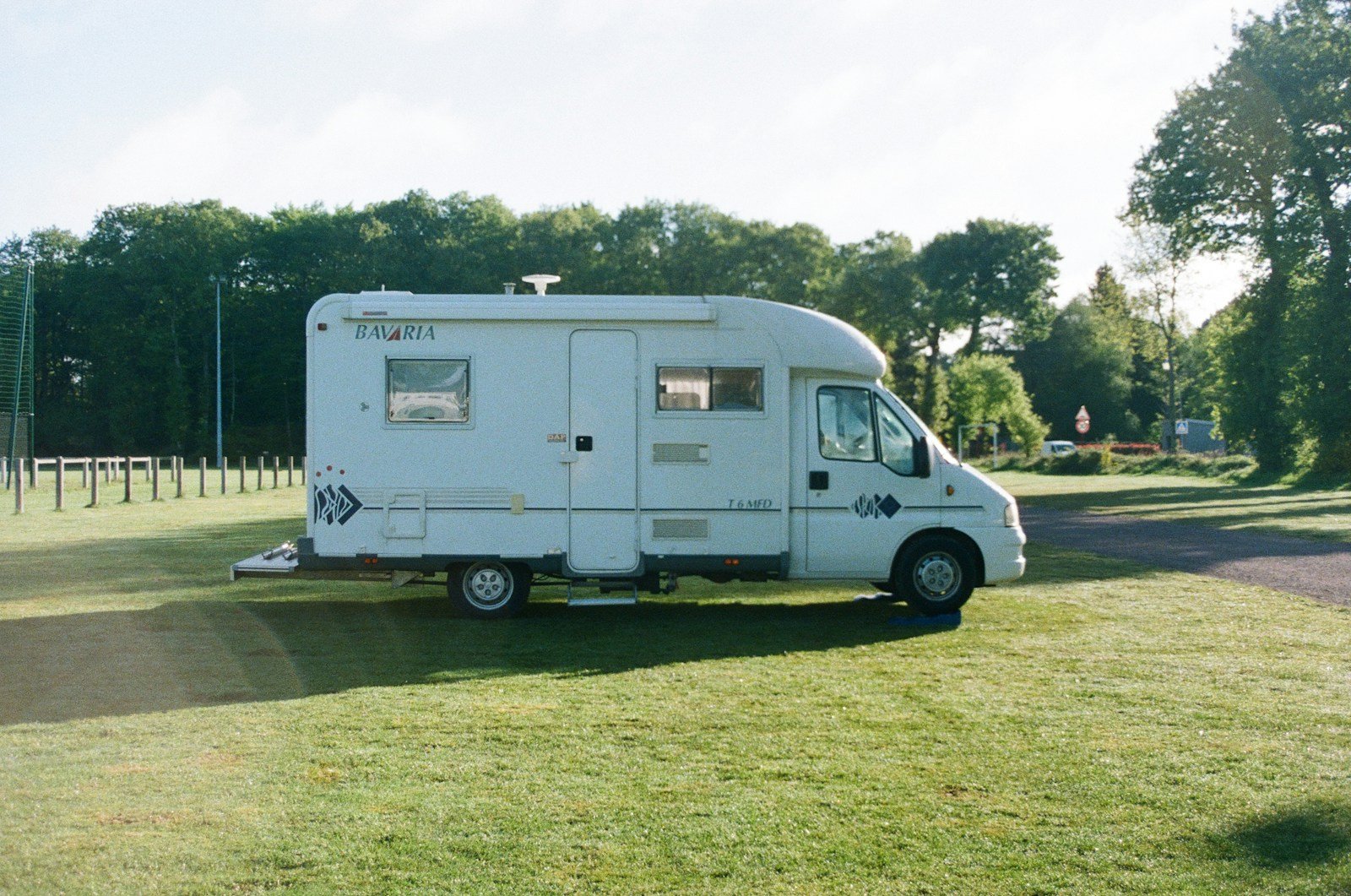 A motorhome parked on grass