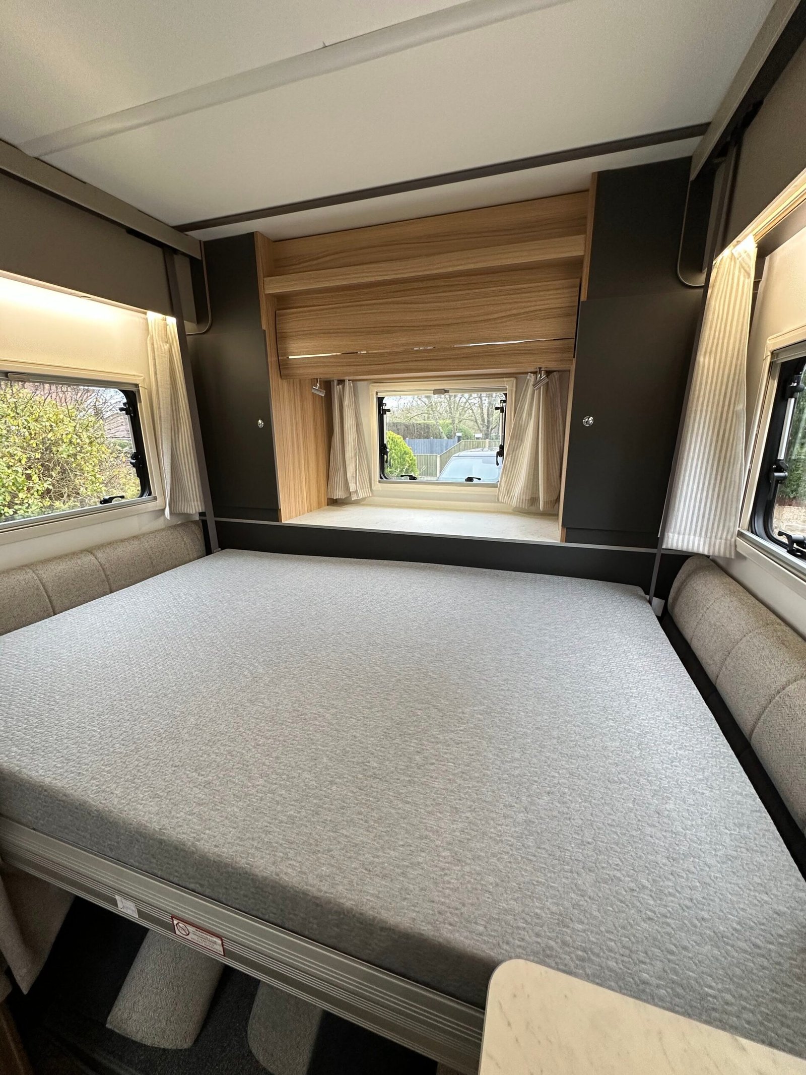 The rear bed, full width across the back